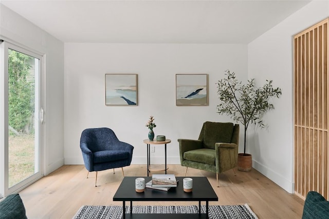 6806 Syracuse Cv, Austin, TX 78723 - sitting room with light wood-style floors and baseboards