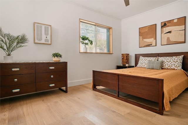 6806 Syracuse Cv, Austin, TX 78723 - bedroom with light wood finished floors, ornamental molding, and ceiling fan