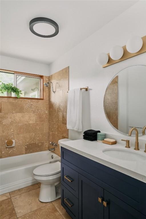 6806 Syracuse Cv, Austin, TX 78723 - bathroom featuring vanity and bathing tub / shower combination