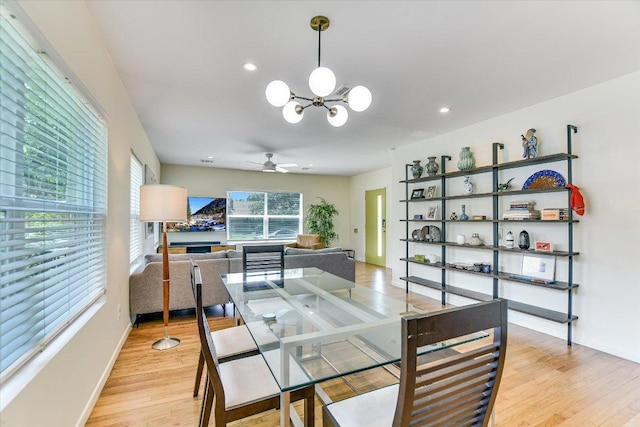 3004 Breeze Ter, Austin, TX 78722 - dining room featuring a chandelier, light wood-type flooring, ceiling fan, and recessed lighting