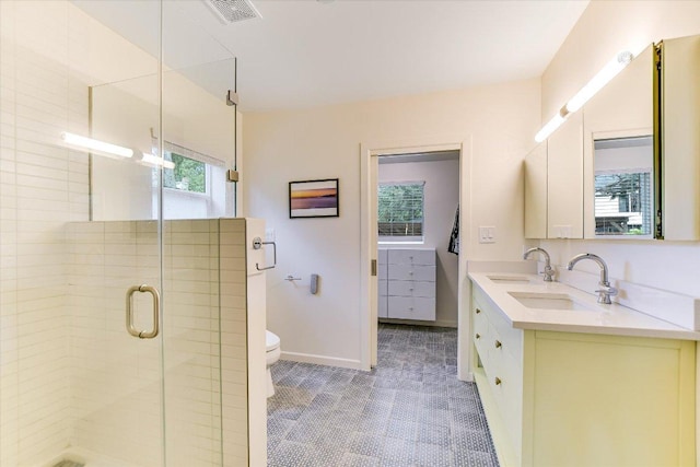 3004 Breeze Ter, Austin, TX 78722 - full bath with plenty of natural light, double vanity, and a shower stall