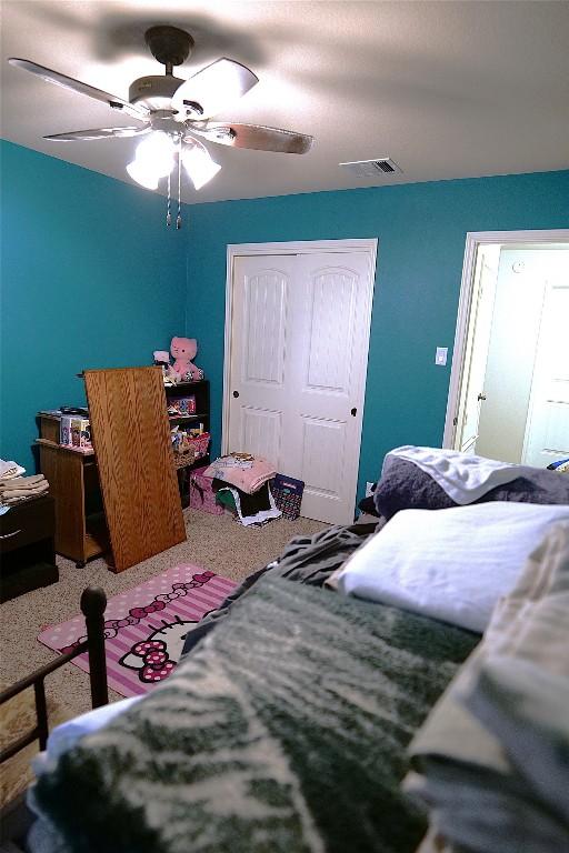 201 Hale Irwin Loop, Round Rock, TX 78664 - bedroom with a closet, carpet floors, and ceiling fan