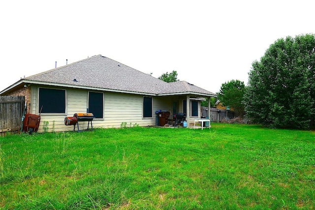 201 Hale Irwin Loop, Round Rock, TX 78664 - rear view of house featuring roof with shingles