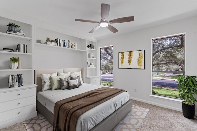 7907 Tealwood Trl, Austin, TX 78731 - bedroom with light carpet and a ceiling fan