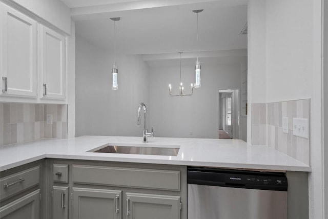 7907 Tealwood Trl, Austin, TX 78731 - kitchen with stainless steel dishwasher, decorative backsplash, and light countertops