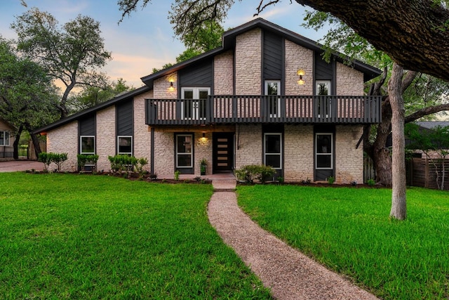 10006 Mandeville Cir, Austin, TX 78750 - back of house with a lawn and a deck