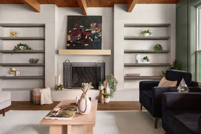 10006 Mandeville Cir, Austin, TX 78750 - living room with a wood ceiling with exposed beams, wood finished floors, and built in features