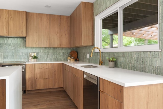 10006 Mandeville Cir, Austin, TX 78750 - kitchen featuring dishwasher, modern cabinets, light countertops, decorative backsplash, and wood finished floors
