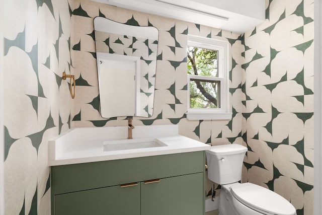 10006 Mandeville Cir, Austin, TX 78750 - half bathroom with wallpapered walls and vanity