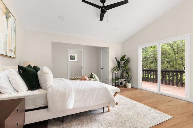 10006 Mandeville Cir, Austin, TX 78750 - bedroom featuring access to exterior, wood finished floors, lofted ceiling, and a ceiling fan