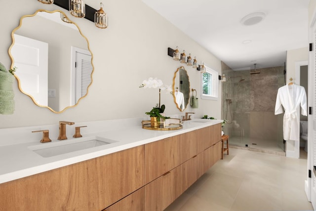 10006 Mandeville Cir, Austin, TX 78750 - full bathroom featuring a shower stall, double vanity, and tile patterned flooring
