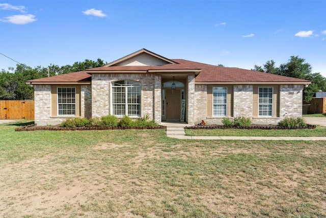 6005 La Mesa St, Leander, TX 78645 - ranch-style house featuring brick siding