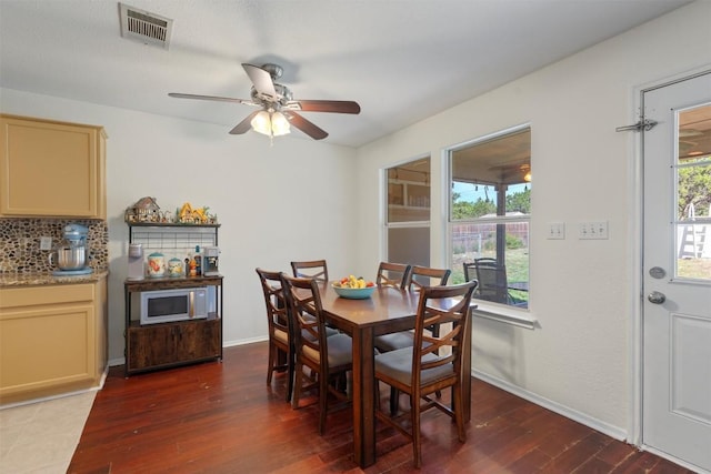 6005 La Mesa St, Leander, TX 78645 - dining room with dark wood-type flooring and a ceiling fan
