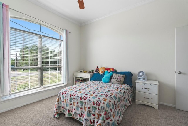 6005 La Mesa St, Leander, TX 78645 - carpeted bedroom featuring multiple windows, crown molding, and a ceiling fan
