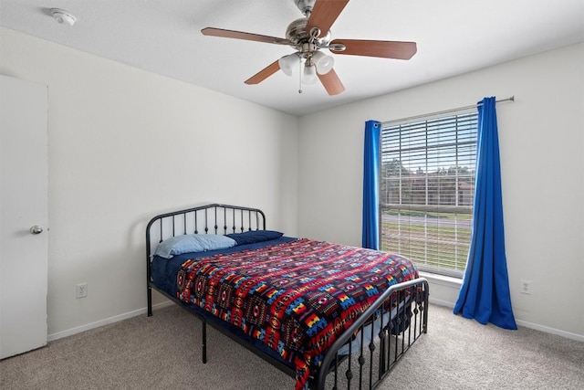 6005 La Mesa St, Leander, TX 78645 - carpeted bedroom featuring a ceiling fan and baseboards