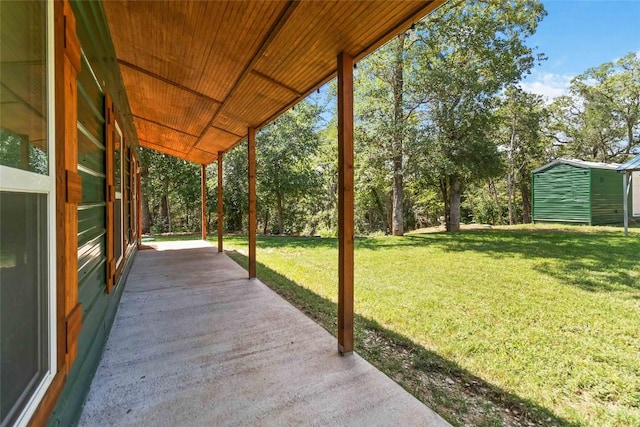 106 Harper Dr, Bastrop, TX 78602 - view of patio / terrace with a storage unit
