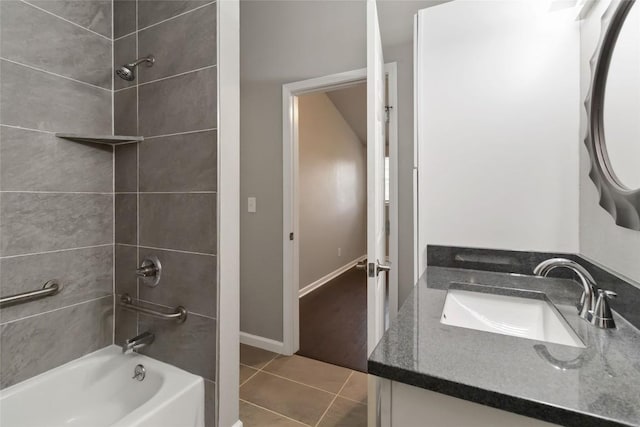 106 Harper Dr, Bastrop, TX 78602 - full bath featuring vanity, washtub / shower combination, and tile patterned floors