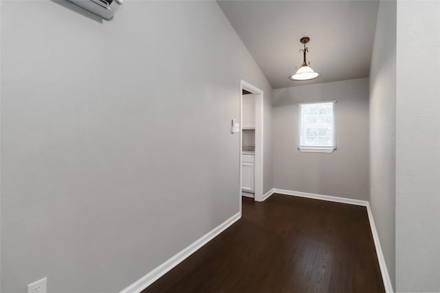 106 Harper Dr, Bastrop, TX 78602 - corridor featuring dark wood finished floors and lofted ceiling