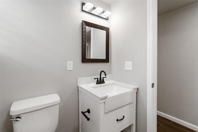 106 Harper Dr, Bastrop, TX 78602 - half bath with vanity and wood finished floors