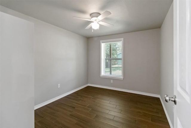 106 Harper Dr, Bastrop, TX 78602 - spare room with a ceiling fan and dark wood-style floors