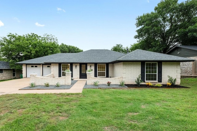 8909 Laurel Grove Dr, Austin, TX 78758 - single story home featuring a garage, driveway, roof with shingles, a front lawn, and brick siding
