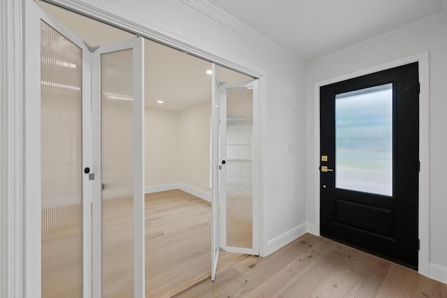 8909 Laurel Grove Dr, Austin, TX 78758 - foyer entrance featuring french doors and light wood-type flooring
