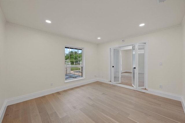 8909 Laurel Grove Dr, Austin, TX 78758 - unfurnished room with light wood-style flooring and recessed lighting