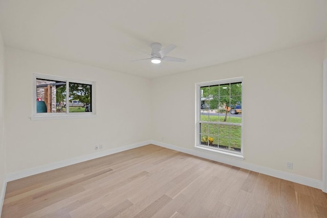 8909 Laurel Grove Dr, Austin, TX 78758 - spare room with light wood-style flooring and ceiling fan