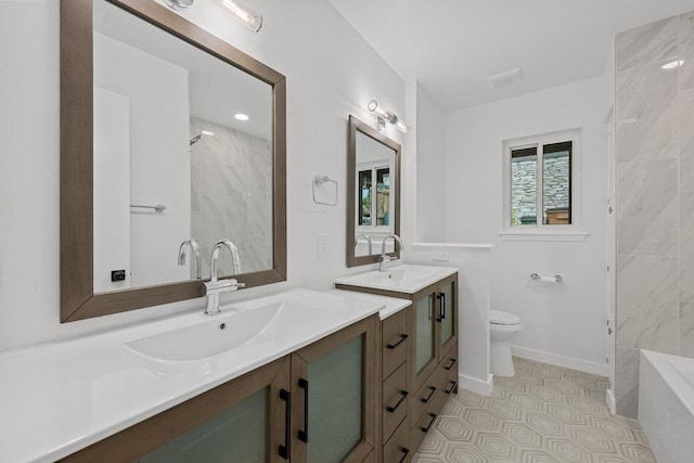 8909 Laurel Grove Dr, Austin, TX 78758 - bathroom with a bathtub, two vanities, and a shower