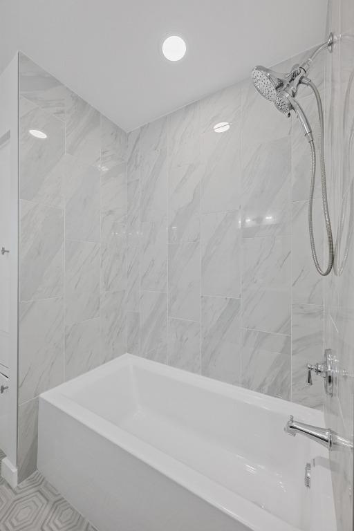 8909 Laurel Grove Dr, Austin, TX 78758 - full bathroom featuring washtub / shower combination