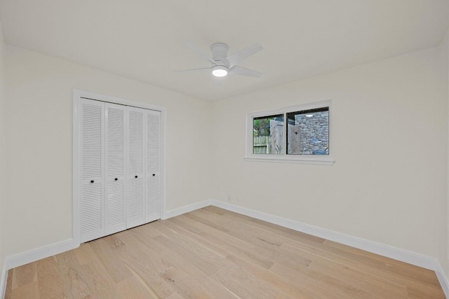 8909 Laurel Grove Dr, Austin, TX 78758 - unfurnished bedroom featuring light wood-style floors, a closet, and ceiling fan