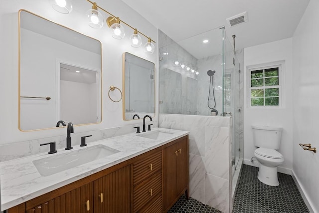 8909 Laurel Grove Dr, Austin, TX 78758 - full bath featuring double vanity and a marble finish shower