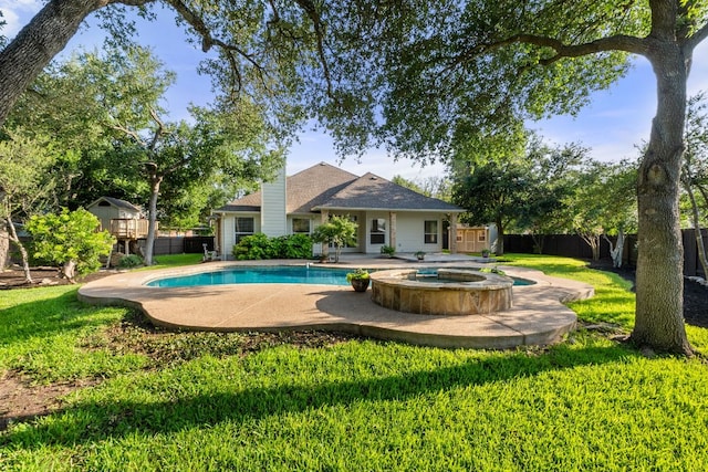 2700 Dagama Ct, Cedar Park, TX 78613 - view of pool with a fenced backyard, a patio area, a pool with connected hot tub, and a storage unit
