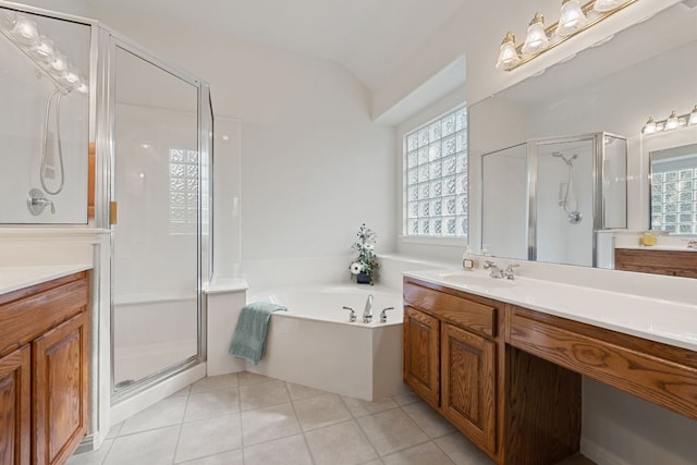 2700 Dagama Ct, Cedar Park, TX 78613 - bathroom featuring a shower stall, vanity, a bath, tile patterned floors, and lofted ceiling