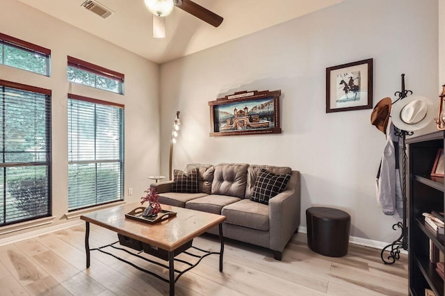 4231 N Summercrest Loop, Round Rock, TX 78681 - living room featuring light wood-type flooring and a ceiling fan