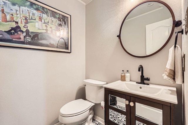 4231 N Summercrest Loop, Round Rock, TX 78681 - half bath with vanity, a textured wall, and ornamental molding