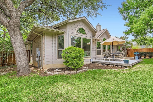 4231 N Summercrest Loop, Round Rock, TX 78681 - back of house with a chimney and a patio