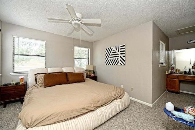 7825 Beauregard Cir Unit 26, Austin, TX 78745 - carpeted bedroom featuring a textured ceiling and a ceiling fan