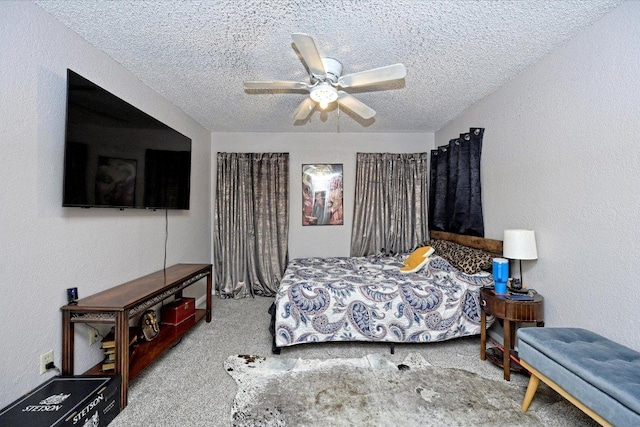 7825 Beauregard Cir Unit 26, Austin, TX 78745 - carpeted bedroom featuring a textured ceiling, ceiling fan, and a textured wall