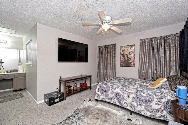 7825 Beauregard Cir Unit 26, Austin, TX 78745 - carpeted bedroom featuring a textured ceiling and ceiling fan