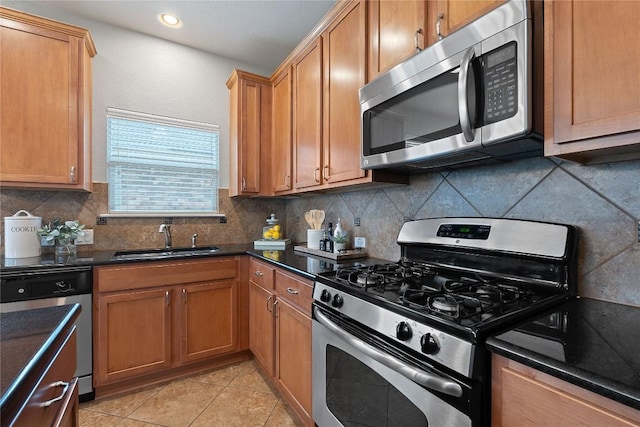 11221 Old Quarry Rd, Austin, TX 78717 - kitchen with stainless steel appliances, dark countertops, tasteful backsplash, light tile patterned flooring, and recessed lighting