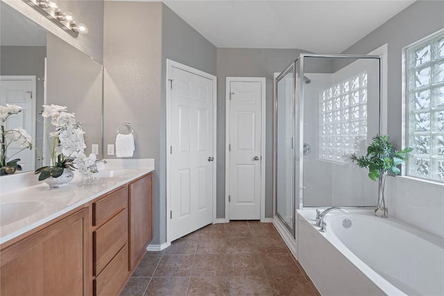 11221 Old Quarry Rd, Austin, TX 78717 - bathroom with a stall shower, a garden tub, double vanity, and healthy amount of natural light