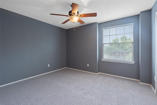 11221 Old Quarry Rd, Austin, TX 78717 - carpeted empty room with ceiling fan and baseboards