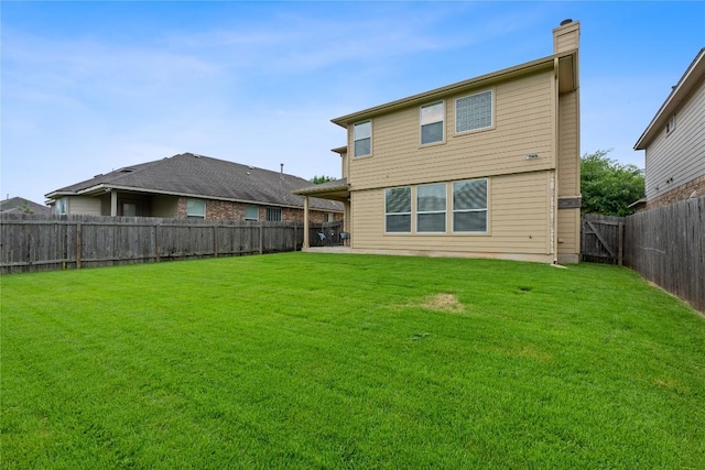 11221 Old Quarry Rd, Austin, TX 78717 - rear view of house featuring a chimney and a fenced backyard