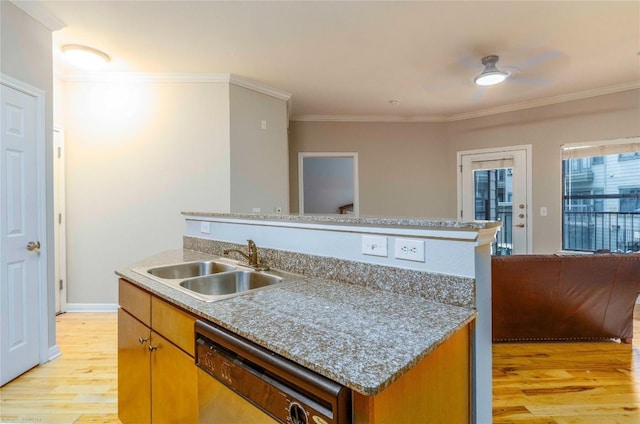 2502 Leon St Unit 305, Austin, TX 78705 - kitchen featuring dishwasher, light wood finished floors, ornamental molding, an island with sink, and brown cabinets
