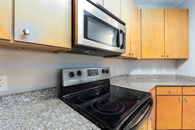 2502 Leon St Unit 305, Austin, TX 78705 - kitchen with appliances with stainless steel finishes and light countertops