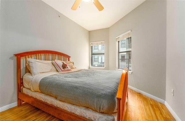2502 Leon St Unit 305, Austin, TX 78705 - bedroom with wood finished floors and a ceiling fan