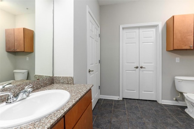 2502 Leon St Unit 305, Austin, TX 78705 - bathroom featuring a closet, vanity, and tile patterned flooring