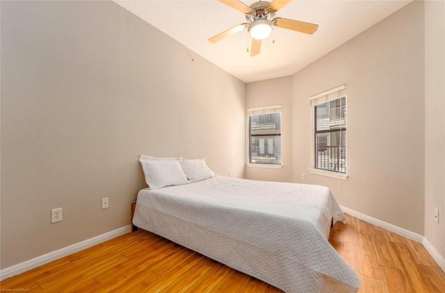 2502 Leon St Unit 305, Austin, TX 78705 - bedroom featuring light wood-style floors and ceiling fan
