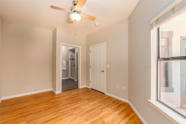 2502 Leon St Unit 305, Austin, TX 78705 - empty room with light wood-style floors and ceiling fan